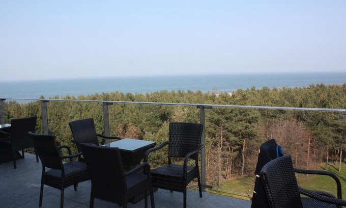 Cetniewo Apartment | Experience Apartament Patio: Steps from the Beach!