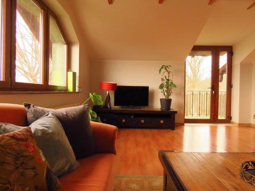 Koscierzyna Apartment | Family-Friendly Retreat at Apartament Pod Lasem - Rated 9.6/10