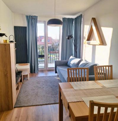 Serock Apartment | Charming Złoty Trójkąt Apartment with Underground Parking