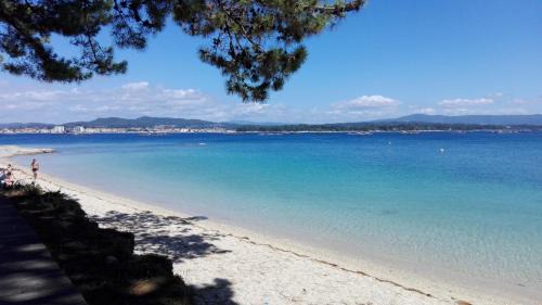 Isla de Arosa Apartment | Inviting Oceanfront Apartment A Laxe with Family-Friendly Amenities