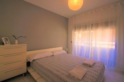 Raval Roig Apartment | Beachfront CasaTuris Apartment with Stunning Ocean Views