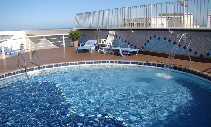 Parque da Areia Preta Apartment | Inviting Apartment with Pool Near Guarapari Beach