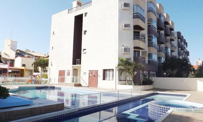 Ingleses Norte Apartment | Ocean View Apartment with Pool Access and Hot Tub