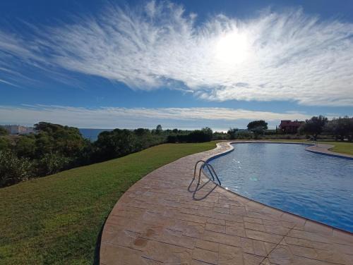 Calafat Apartment | Oceanfront Apartment with Solarium in Marina Sant Jordi