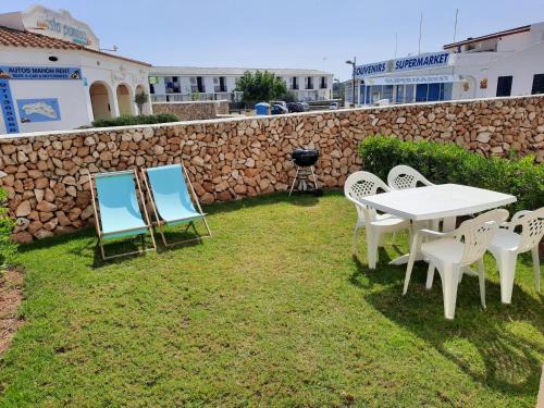 Arenal d'en Castell Apartment | Beachside Apartment in Arenal with Pool and Ocean Views