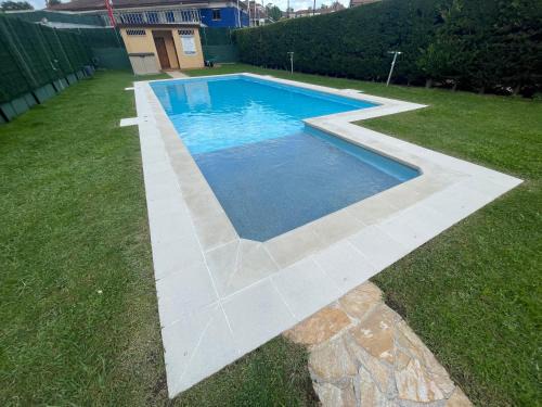 Saron Apartment | Experience Viento del Norte: Poolside Family Retreat