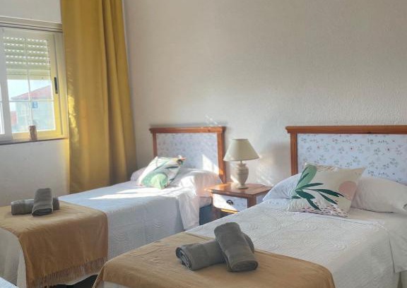 Suances Apartment | Cozy Apartment Flori with Terrace, Steps from the Beach