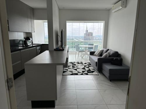Pinheiros Apartment | Elegant Faria Lima Apartment with Pool & Ocean View