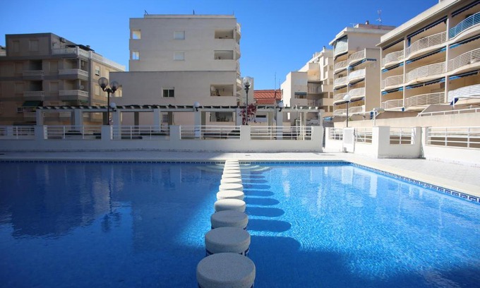 Oropesa del Mar Apartment | Relax at Apartamento Oroblanc: 4-Star with Pool Access