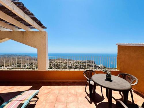 Cumbre del Sol Apartment | Panorama X0089: Family-Friendly Retreat with Pool Access