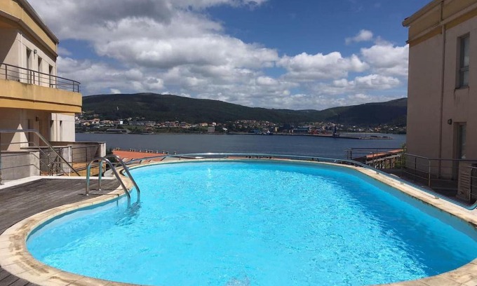 Corcubion Apartment | Beachfront Apartment Playa de Quenxe with Pool & Views