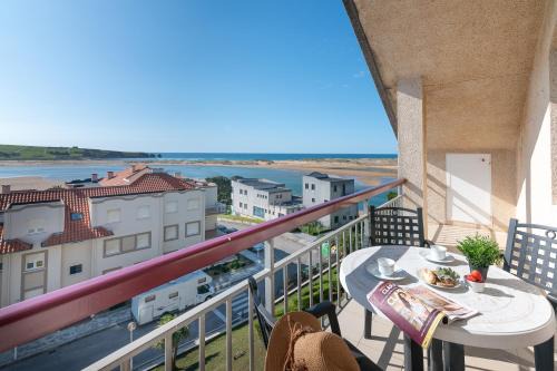Mogro Apartment | Oceanfront Retreat at Apartamento Ría de Mogro - 9/10 Rating