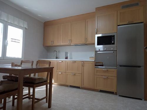 Carino Apartment | Family-Friendly Stay at Apartamento en Cariño Awaits You