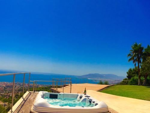 Pinares de San Anton Apartment | Oceanfront Stradivarius Apartment with Pool & Hot Tub