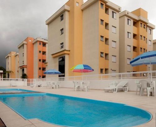 Ipiranguinha Apartment | Inviting Sun Way Ubatuba: Poolside Retreat with Top Ratings