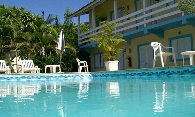 Juquehy Hotel | Inviting Apartamentos Atobá Juquehy with Pool and Kitchen