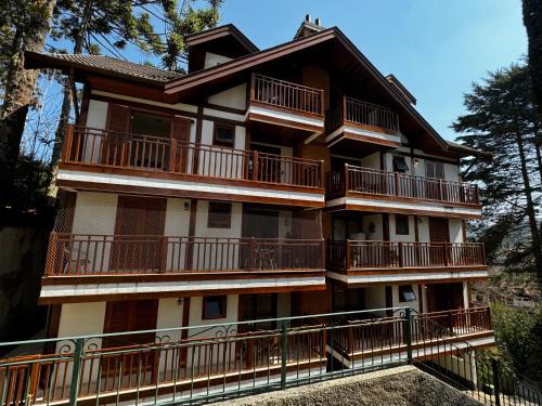 Vila Inglesa Apartment | Experience Apartamentos Centrinho Capivari - Rated 9.8/10