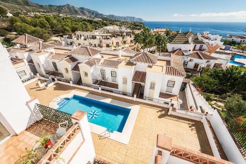 Chimenea Apartment | Top Rated Apartamentos Chimenea with Pool & Family Amenities