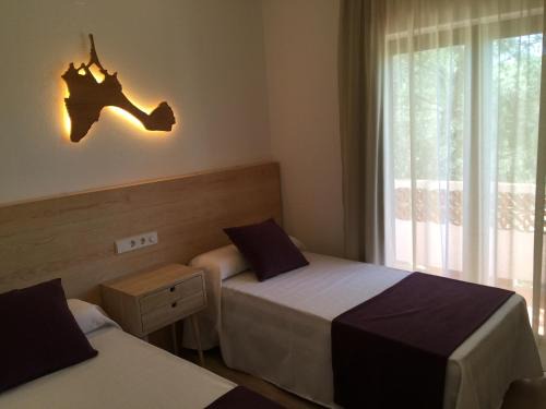 Es Calo Apartment | Oceanfront Apartamentos DELFIN: Guest Rated 9.5/10