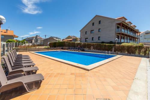 Aios Apartment | Cozy Eira Do Mar Apartments: Top-Rated with Pool & Pets Welcome