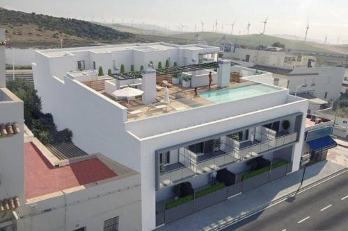 Zahara de los Atunes Apartment | Oceanfront Apartamentos Cachón with Pool and Family Comfort