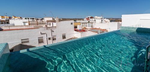 Ayamonte Apartment | Elegant Apartamentos Doña Bella 2a with Pool & Family Amenities