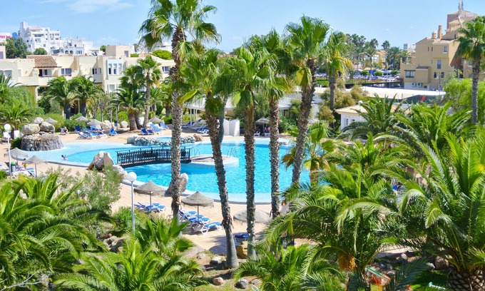 Roquetas de Mar Apartment | Relax at Apartamentos Moguima: Oceanfront Retreat with Pool