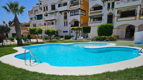 Roquetas de Mar Apartment | Beachfront Apartamentos Roquetas Beach with Pool & Ocean Views