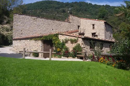 Campelles House | Idyllic Oceanfront Retreat at Apartaments turistics Moli Can Coll