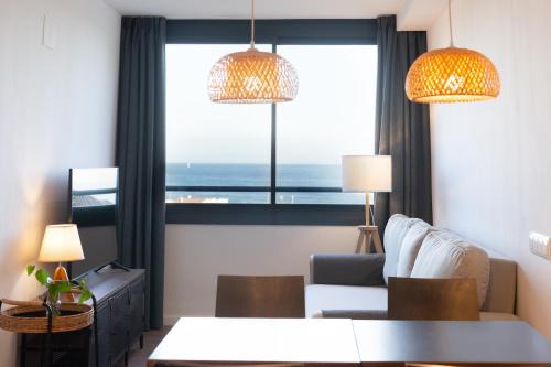 Caldes d'Estrac Apartment | Oceanfront Comfort at Apartaments Voralmar - Rated 9.6/10