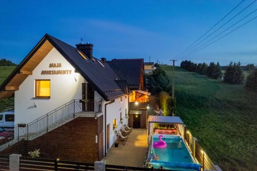 Krynica-Zdroj Apartment | Oceanfront Retreat: Apartamenty Maja with Pool & Hot Tub