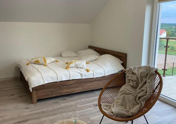 Zagnansk Apartment | Discover Boho Hill Apartments with Jacuzzi & Sauna