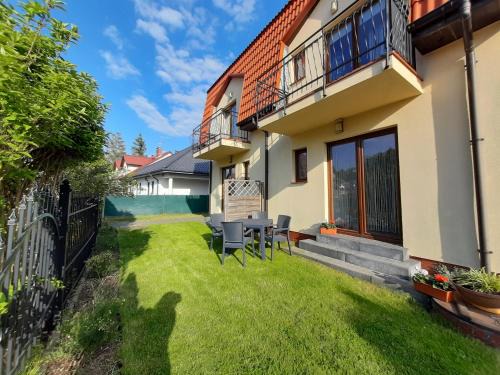 Trzesacz Apartment | Oceanfront Getaway at Apartamenty Obok Ruin - 9.5/10 Rating