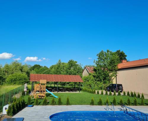 Faszcze Apartment | Top-Rated Apartamenty Zełwągi 15 with Pool & Family Appeal
