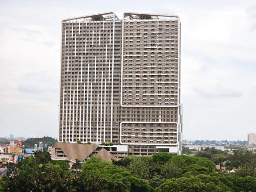 Pinang Apartment | Relax at Springwood Apartments with Pool & Family-Friendly Fun