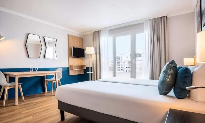 Gambetta Apartment | ```html
Pet-Friendly Aparthotel Adagio La Défense Kléber Awaits You
```