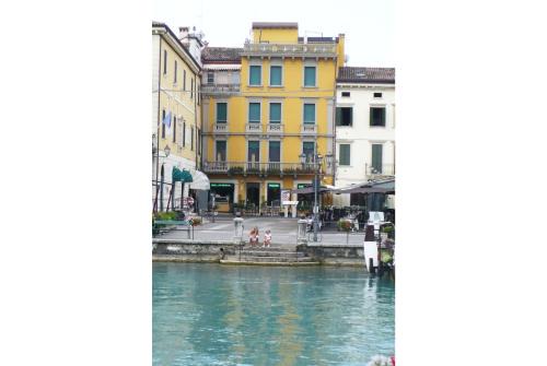 Peschiera del Garda City Centre Apartment | Unforgettable Stay at Aparthotel All'Orologio: 4-Star Comfort