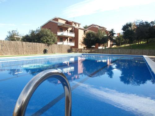 Sant Cugat del Valles Apartment | Beachfront Comfort at Aparthotel del Golf - Rated 9.1