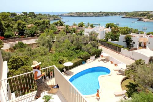 Portopetro Apartment | Discover Aparthotel Niu d'Aus: Ocean Views & Pool Bliss
