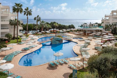 Santa Eulalia del Rio Apartment | Explore Aparthotel Tropic Garden with Pool & Hot Tub Access