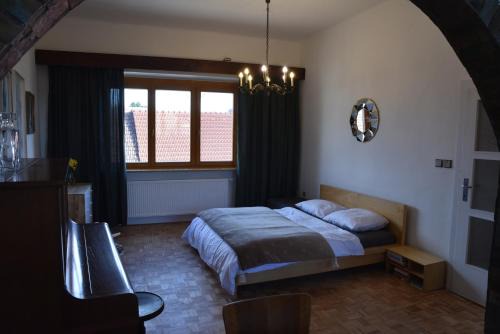 Lednice Apartment | Elegant Piano Apartment: Family-Friendly Retreat Awaits
