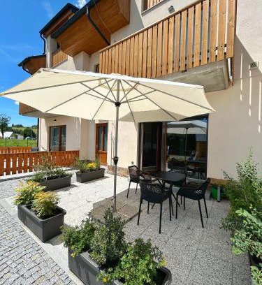 Kasperske Hory Apartment | Bright Apartment with Sunny Terrace in Kašperkách