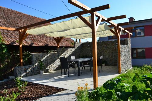 Luhacovice Apartment | Inviting apartmány LUHA: Rated 10/10 with Hot Tub & Fireplace