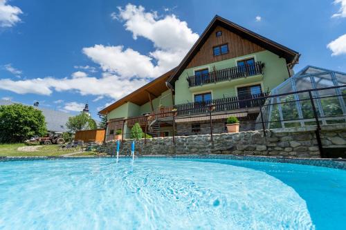Dolni Morava Apartment | Discover Apartmány U Žaloudků: 9/10 Rating & Pool Access