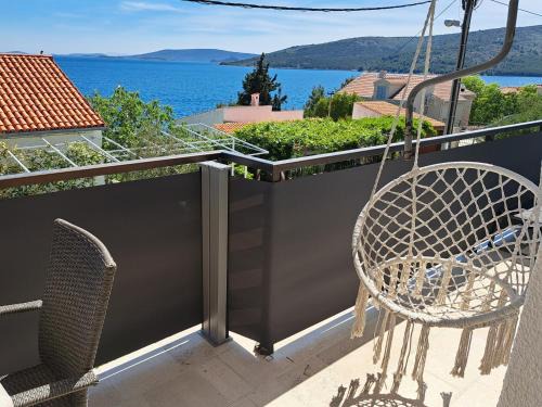 Seget Vranjica Apartment | Oceanfront Retreat: Apartman Monika with Perfect 10/10 Score