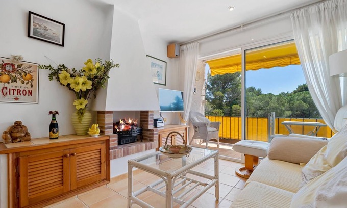 Calella de Palafrugell Apartment | Cozy Apartment Steps from Beach with Parking & Pet Friendly