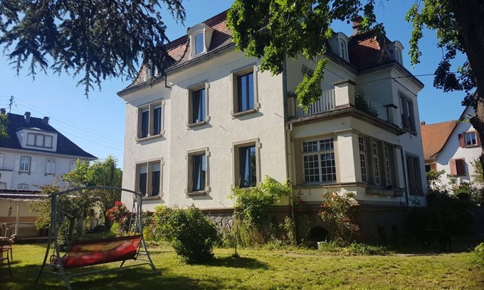 Munster House | Top-Rated Mansion Apartment with Pool and Lake Views