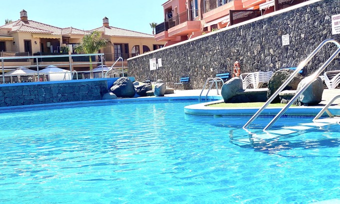 Arona Apartment | Oceanfront Apartment with Pool & Relaxing Terrace, Rated 10/10
