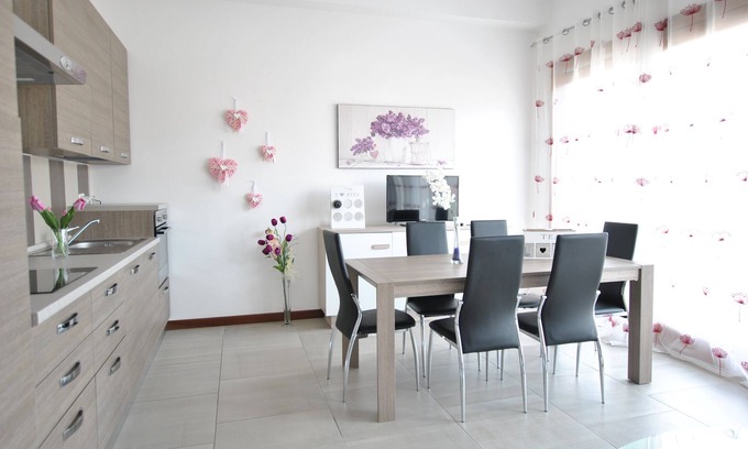 Olbia Apartment | Relaxing Apartment A with Spa, Kitchen & Family-Friendly Perks
