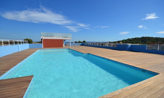 La Faviere Apartment | Stunning Oceanfront Apartment with Rooftop Pool Access